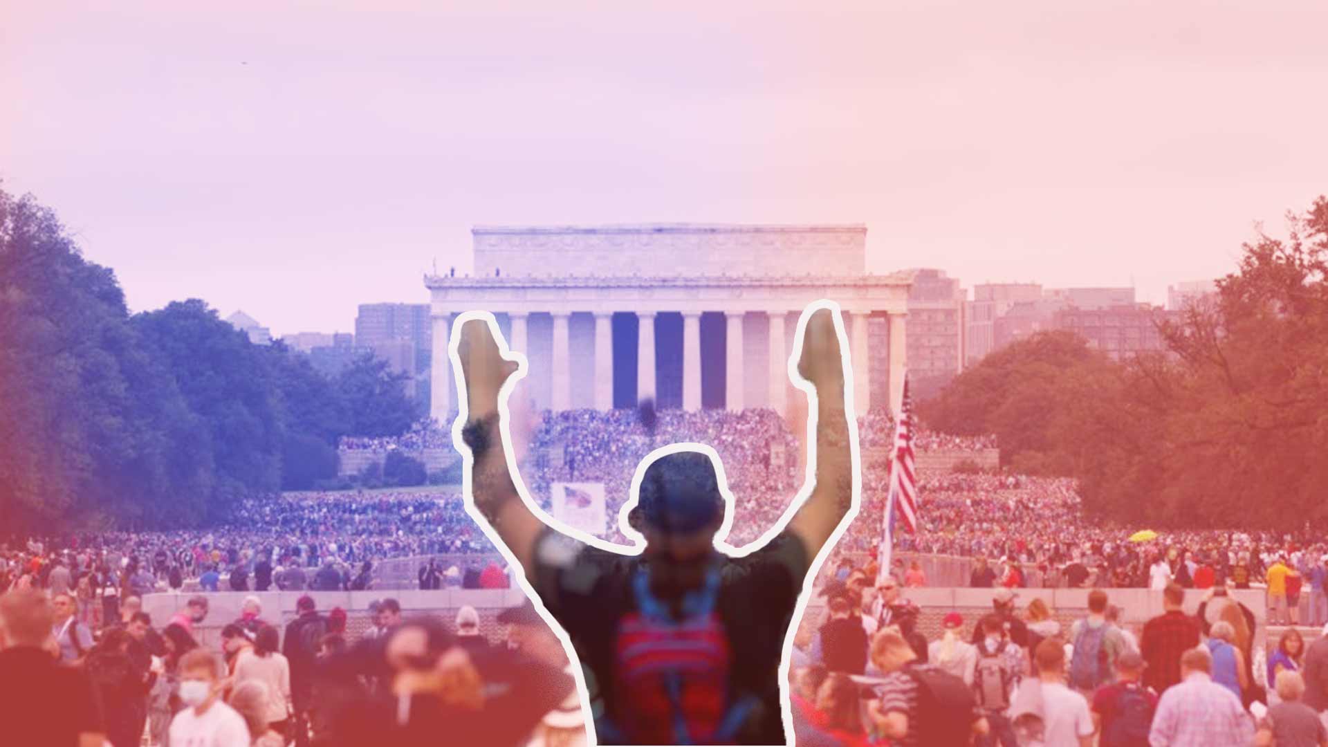 Man Worships in a crowd at the Lincoln Memorial in Washington D.C.