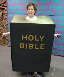 Woman dressed up as the Holy Bible